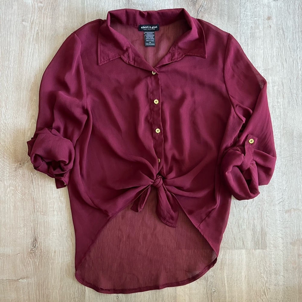 About a girl blouse with gold buttons